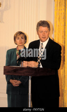 President Clinton gives a speech in the East Room, at the White House with Hillary by his side 1997 Stock Photo