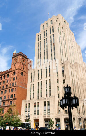 Montreal, Canada - August 19, 2008: Aldred Building, in art deco style on the right and New York Life Building Stock Photo