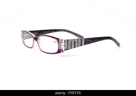 Purple Reading Glasses With Floral Pattern On The Arms Stock Photo