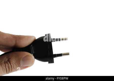 Holding Black plug on white background Stock Photo