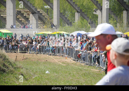 Kovrov, Russia. 10 May 2015. Motocross competitions. Spectators watch the race Stock Photo