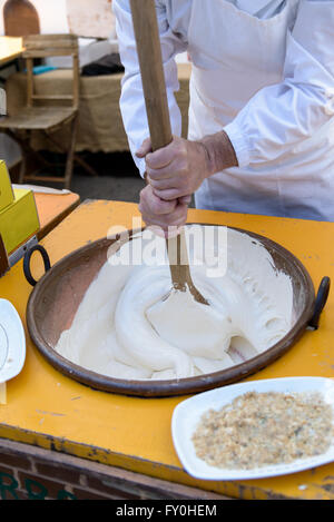 Artisan preparation of nougat in Sardinia, typical cake. Stock Photo