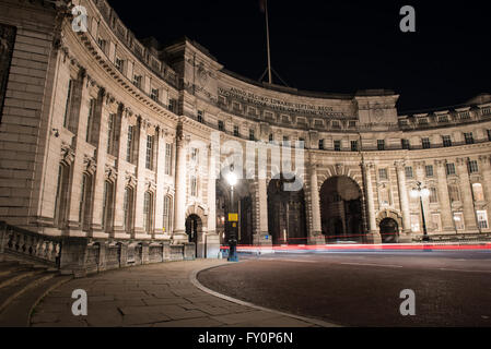 Admiralty Arch, London, England, UK illuminated at night with traffic light trails Stock Photo