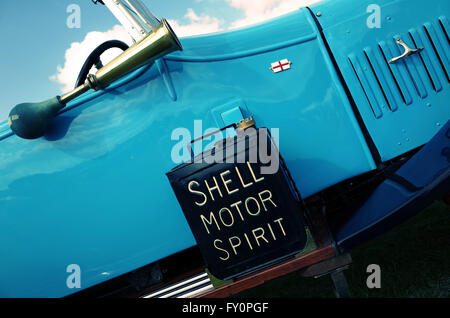 Shell Motor Spirit fuel can on the side of a classic car Stock Photo