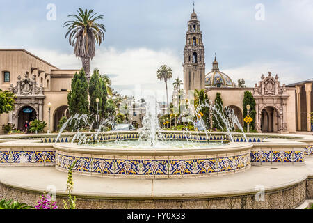 fountain in the center of the prado with san diego museum of man and the old globe theatre in the background in balboa park, san Stock Photo