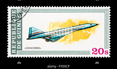 Postage stamp from Guinea depicting the Concorde airplane. Stock Photo