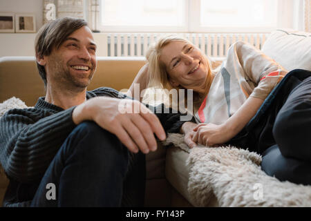 Happy mature couple spending leisure time at home Stock Photo