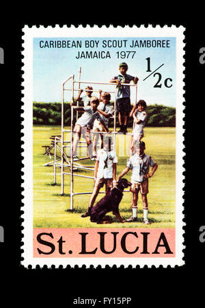 Postage stamp from St. Lucia depicting Boy Scouts, issued for the 1977 Caribbean Boy Scout Jamboree in Jamaica. Stock Photo