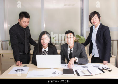 Business group  in a meeting smiling at the camera Stock Photo