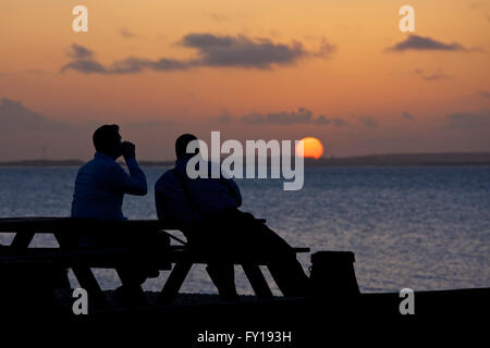 Whitstable, Kent, UK. 19th April 2016: UK Weather. Watching the sunset ...