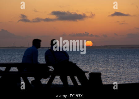 Whitstable, Kent, UK. 19th April 2016: UK Weather. Watching the sunset ...