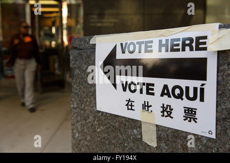 New York, USA. 19th Apr, 2016. A direction sign is seen outside a polling station in Manhattan, New York, United States, April 19, 2016. New York's presidential primary kicked off on Tuesday. © Li Muzi/Xinhua/Alamy Live News Stock Photo