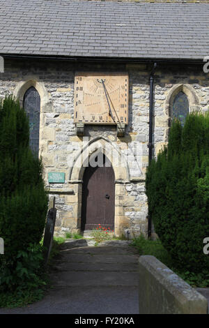 A sundial at St Lawrence’s Church in the plague village of Eyam Derbyshire UK Stock Photo