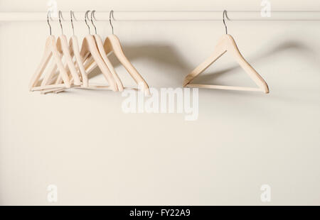 Empty hangers on a clothes rack Stock Photo