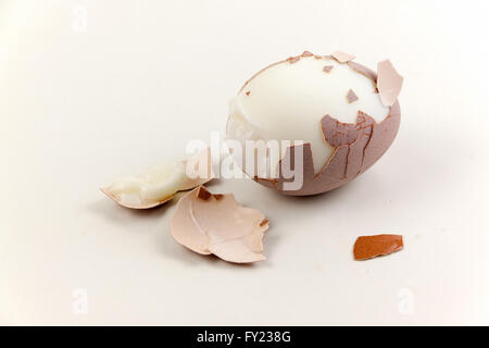peeled boiled egg on white background Stock Photo