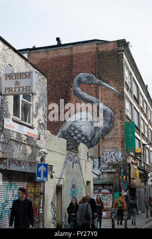 Street art of a bird by Roa a Belgian street artist, this piece is in Hanbury Street. Stock Photo