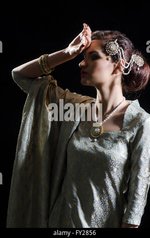 Asian woman hand on head Stock Photo