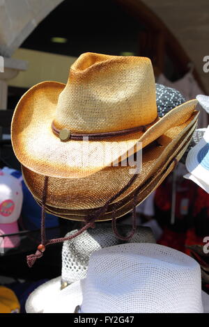 American west straw hats for sale in a market stall Stock Photo