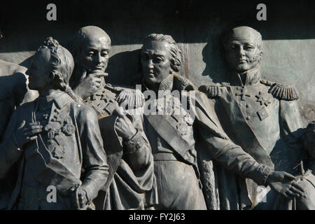 Russian Generalissimo Alexander Suvorov, Russian Field Marshal Michael Barclay de Tolly, Russian Field Marshal Mikhail Kutuzov and Russian Admiral Dmitry Senyavin depicted (from left to right) in the bas relief dedicated to Russian military leaders and heroes by Russian sculptors Matvey Chizhov and Alexander Lubimov. Detail of the Monument to the Millennium of Russia (1862) designed by Mikhail Mikeshin in Veliky Novgorod, Russia. Stock Photo