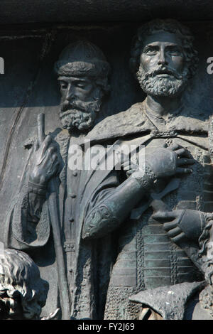 Prince Daumantas of Pskov (L) and Grand Prince Alexander Nevsky of Kiev (R) depicted in the bas relief dedicated to Russian military leaders and heroes by Russian sculptors Matvey Chizhov and Alexander Lubimov. Detail of the Monument to the Millennium of Russia (1862) designed by Mikhail Mikeshin in Veliky Novgorod, Russia. Stock Photo