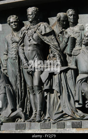 Emperor Alexander I of Russia depicted in the bas relief dedicated to Russian statesmen by Russian sculptor Nikolai Laveretsky. Detail of the Monument to the Millennium of Russia (1862) designed by Mikhail Mikeshin in Veliky Novgorod, Russia. Russian statesman and diplomat Viktor Kochubey is depicted in the left. Russian reformist Mikhail Speransky (L) and Russian military leader Mikhail Vorontsov (R) are depicted in the right. Stock Photo