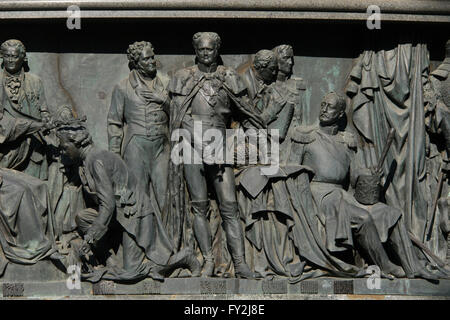 Emperor Alexander I and Emperor Nicholas I of Russia depicted in the bas relief dedicated to Russian statesmen by Russian sculptor Nikolai Laveretsky. Detail of the Monument to the Millennium of Russia (1862) designed by Mikhail Mikeshin in Veliky Novgorod, Russia. Persons from left to right: Alexander Bezborodko, Grigory Potyomkin (kneeling), Viktor Kochubey, Emperor Alexander I of Russia, Mikhail Speransky, Mikhail Vorontsov and Emperor Nicholas I of Russia (sitting). Stock Photo