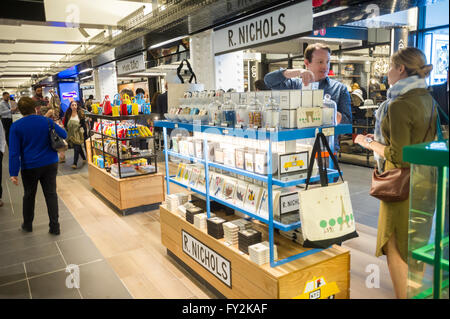 Visitors to the Columbus Circle station in the subway in New York try out the new Turnstyle food hall and retail mall located in a formerly disused corridor on opening day, Tuesday, April 20, 2016. The 30,000 square foot space has  39 shops, both retail and food vendors with a mix curated to appeal to the expected over 90,000 commuters and visitors traveling through the station. (© Richard B. Levine) Stock Photo