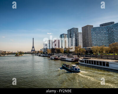 Boats on the river Seine in Paris, France, with Eiffel Tower in background Stock Photo