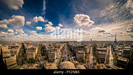 Panoramic view down the Champs-Elysees towards Place de la Concorde, Paris, France. Eiffel Tower and Montparnasse Tower both vis Stock Photo