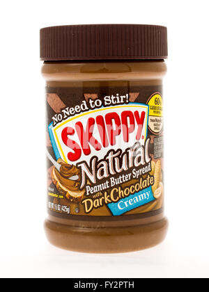 Winneconne, WI - 3 May 2015:  Jar of Skippy Natural peanut butter with dark chocolate in creamy style. Stock Photo