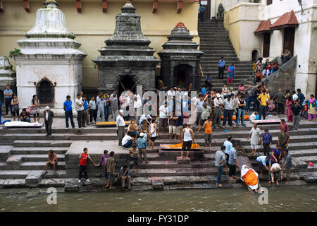 Ceremonial cremation place, Ghats, of Pashupatinath at the holy Bagmati river, Kathmandu, Nepal Stock Photo