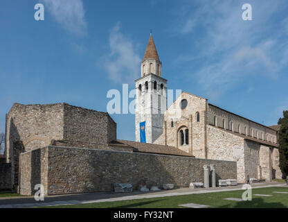 Romanesque basilica with bell tower, 11th century, in front the baptistery, Aquileia, Udine province, Friuli-Venezia Giulia Stock Photo
