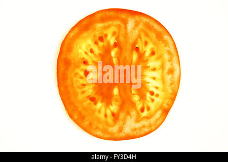one tomatoe slice on white background Stock Photo