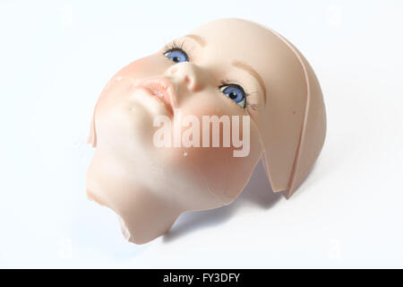 Broken Dolly Face and Limbs Stock Photo