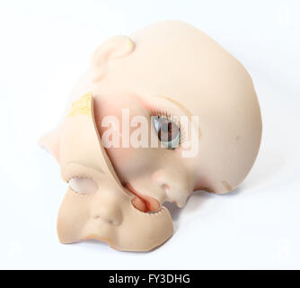 Broken Dolly Face and Limbs Stock Photo