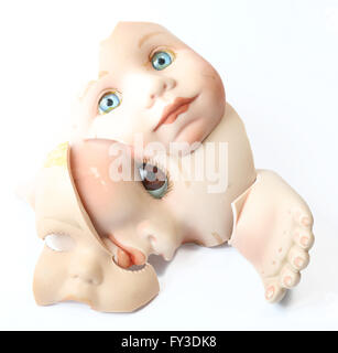 Broken Dolly Face and Limbs Stock Photo