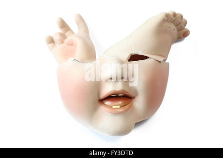 Broken Dolly Face and Limbs Stock Photo