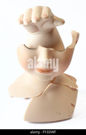 Broken Dolly Face and Limbs Stock Photo