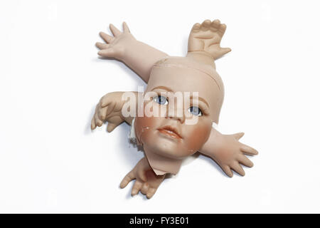 Broken Dolly Face and Limbs Stock Photo