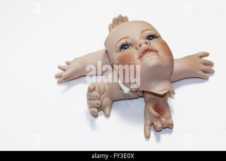 Broken Dolly Face and Limbs Stock Photo