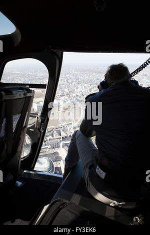 Helicopter over London view from Cockpit and through open door Stock Photo