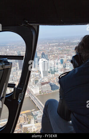 Helicopter over London view from Cockpit and through open door Stock Photo