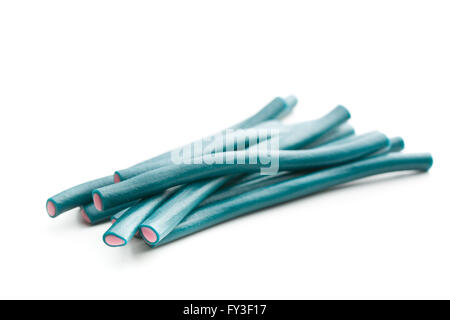 Sweet gummy sticks with raspberry and blackberry flavor. Tasty candies isolated on white background. Stock Photo