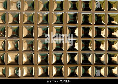 Gold Metal of Luxury golden mosaic for design background. Stock Photo