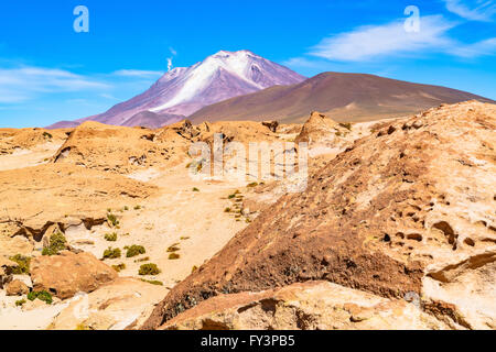 Active volcano with the smoke in Uyuni Bolivia Stock Photo