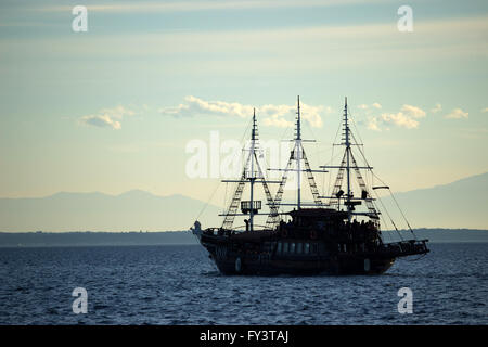 Wooden vintage frigate 'Arabella' ship converted to a bar-caffe, touring in Thermaic gulf water. Thessaloniki, Greece Stock Photo