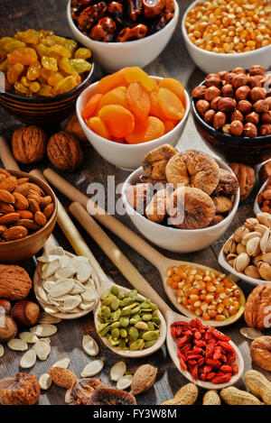 Composition with dried fruits and assorted nuts. Stock Photo