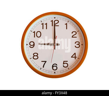 orange wall clock isolated in nine o'clock on white background. Stock Photo