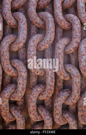 Links of a rusty chain on Lydney Harbour, Lydney, Gloucestershire, UK Stock Photo