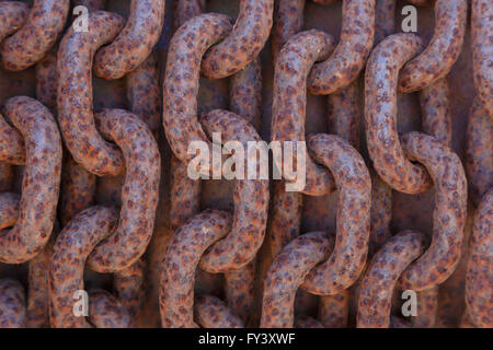 Links of a rusty chain on Lydney Harbour, Lydney, Gloucestershire, UK Stock Photo